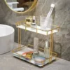 Nordic-style 2-tier bathroom organizer with durable iron frame - perfect for storing skincare, cosmetics, towels, and everyday essentials.