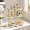 3-Tier Makeup and Cosmetics Storage Organizer with golden metal frame and acrylic trays